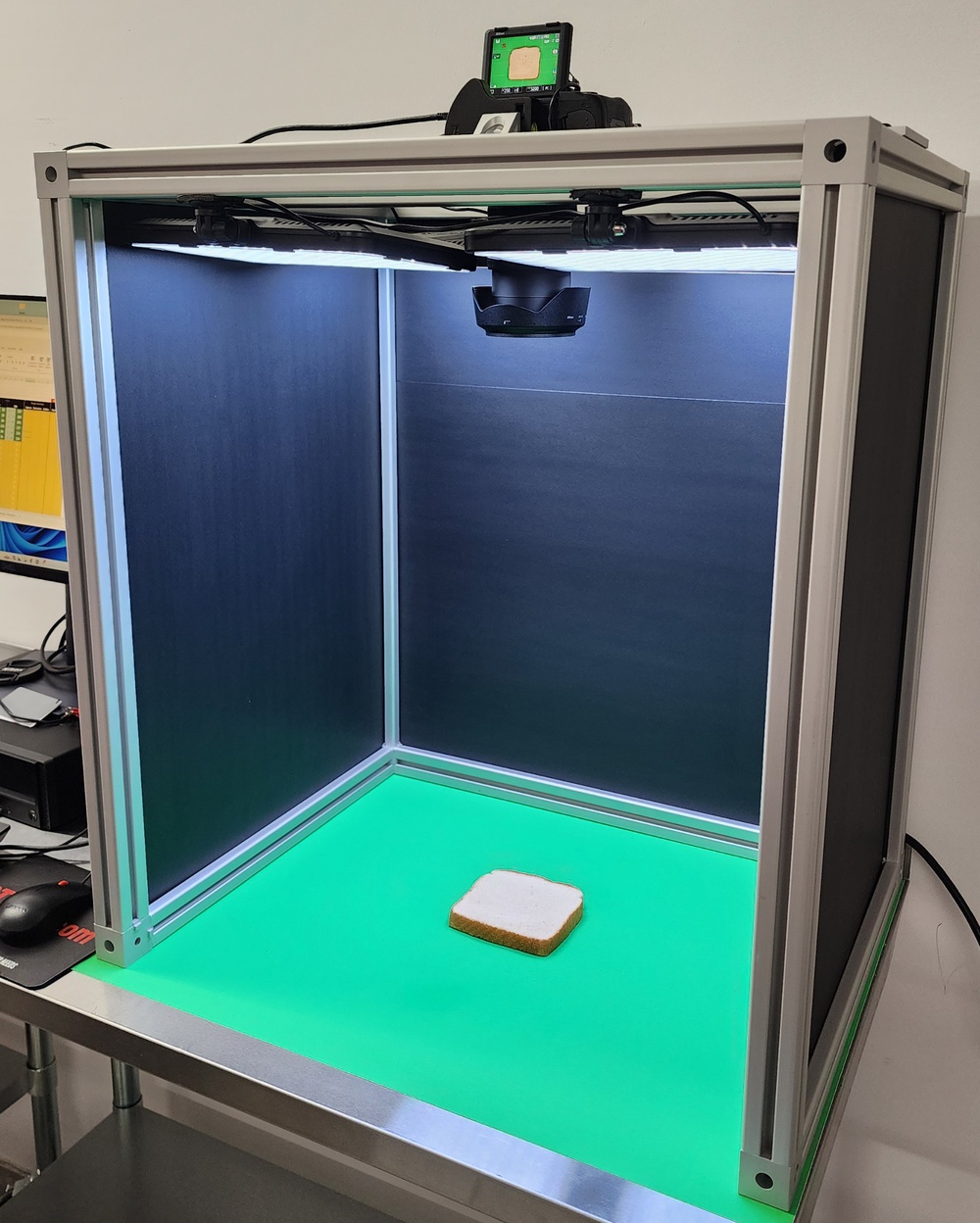 Photo cube setup designed to take consistent photographs of toasted bread.