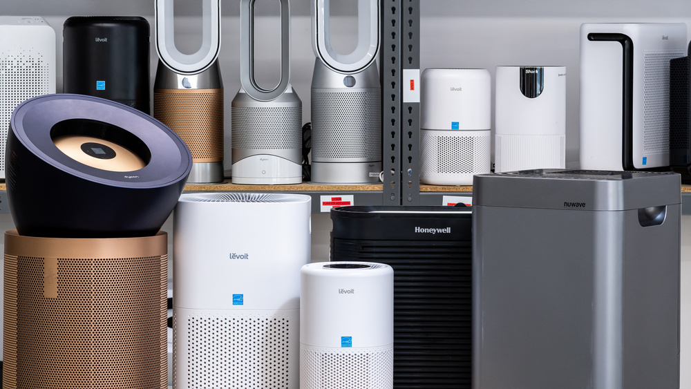 A lineup of air purifiers that we've tested (Foreground, from left to right: Dyson Purifier Big+Quiet Formaldehyde BP04, Levoit Core 600S, Levoit Core 300, Honeywell HPA300, and NuWave OxyPure)  