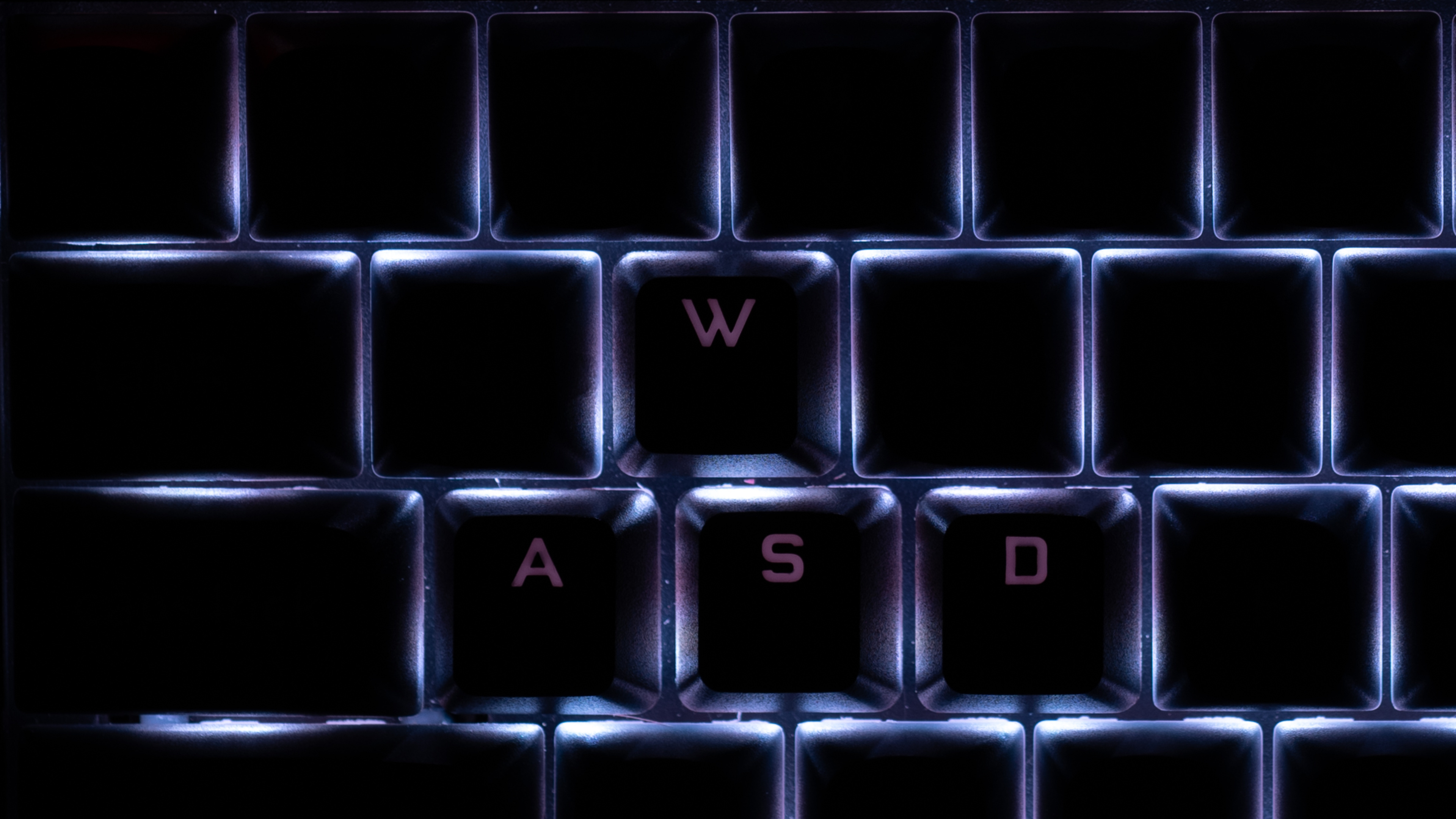 The Keychron Q6 with shine-through keycaps on the WASD keys