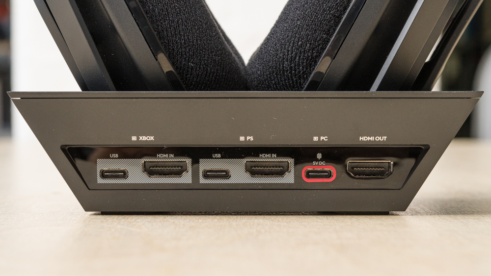 A side view of the Astro A50 X's dock shows three USB-C ports and two HDMI ports for connectivity.